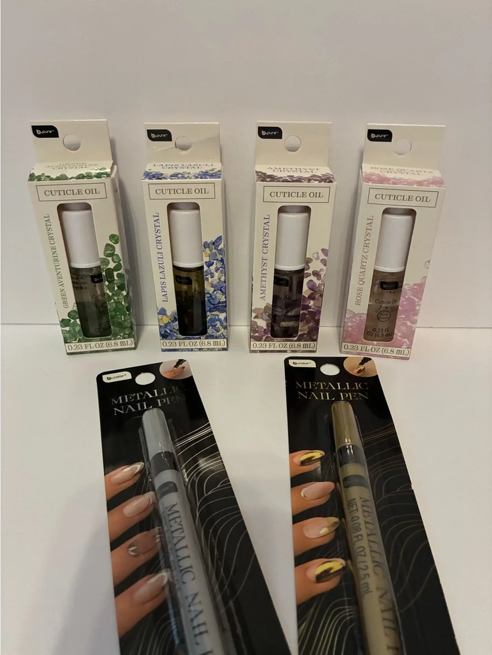 b.Pure Crystals Cuticle Oil & Metallic Nail pens  bundle